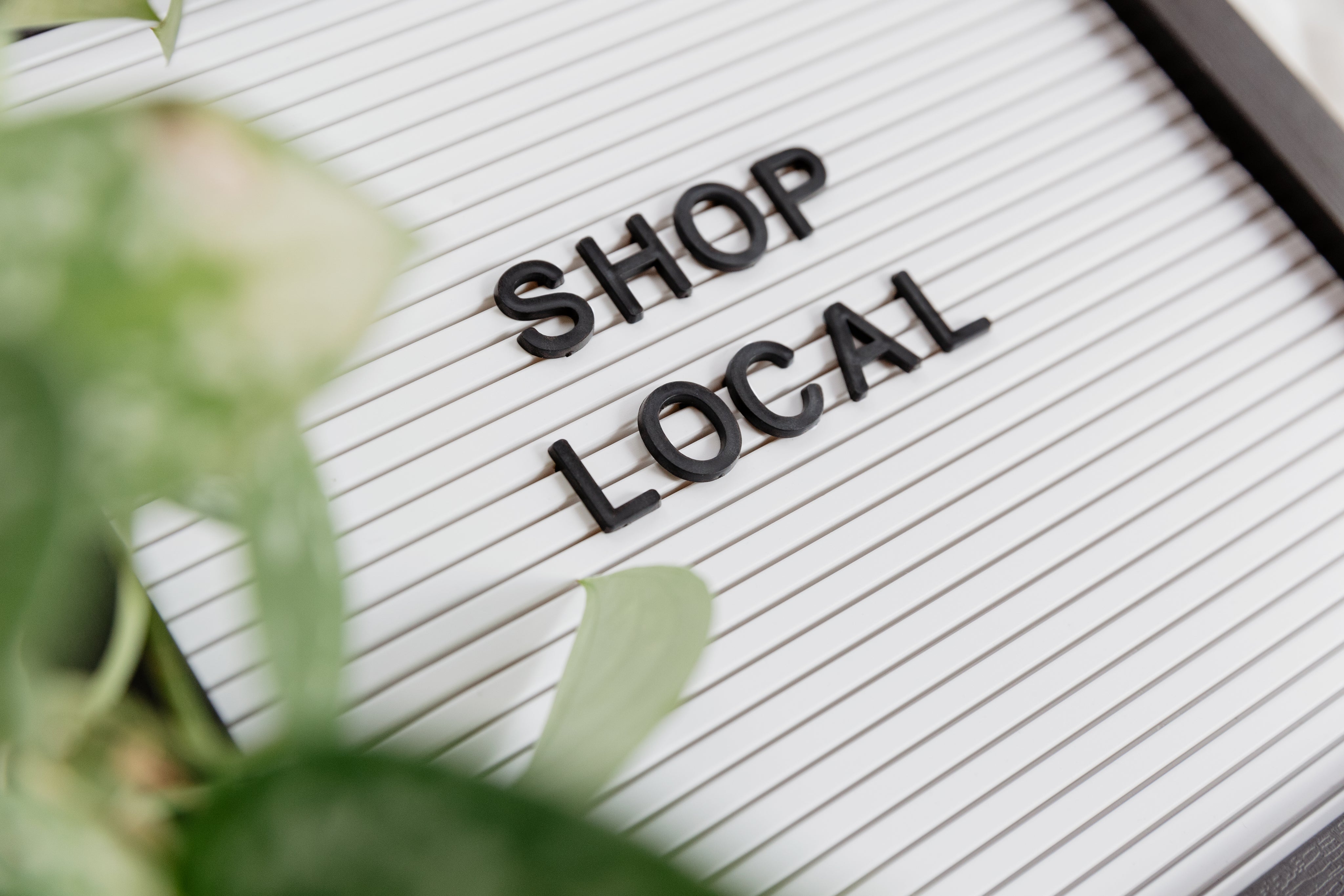 a shop local sign